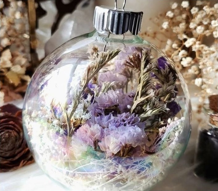 Clear bauble filled with dried flowers
