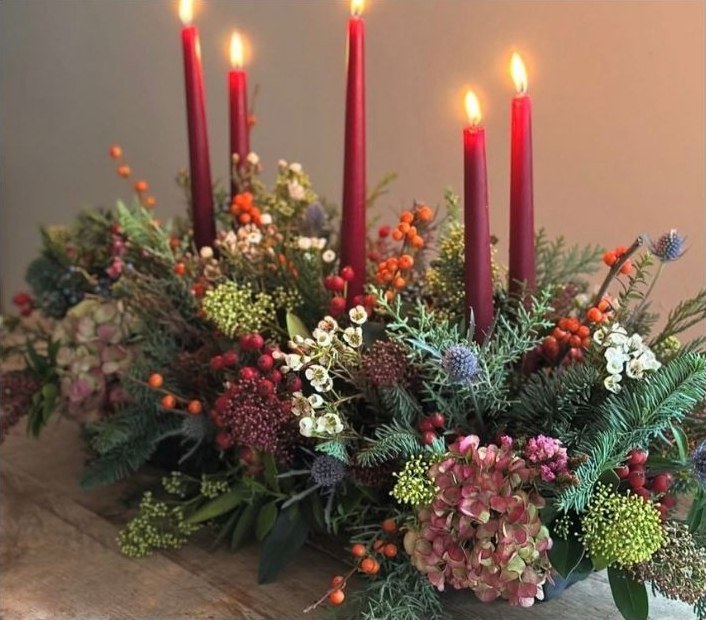 Table decoration with red candles